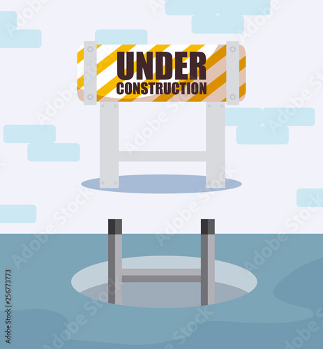 under construction label with barricade fence