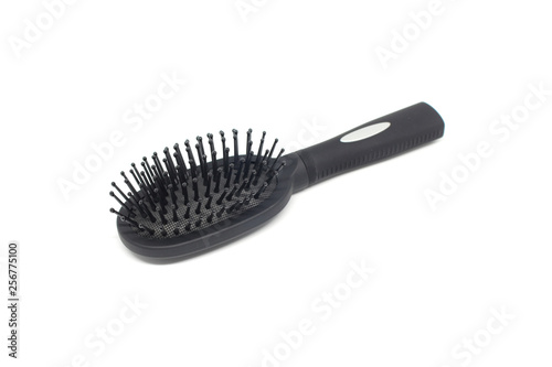 black hairbrush on white background