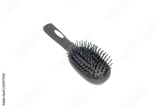 black hairbrush on white background