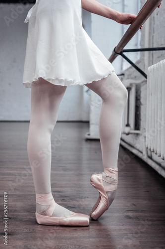 Close up of ballerinas legs in special position