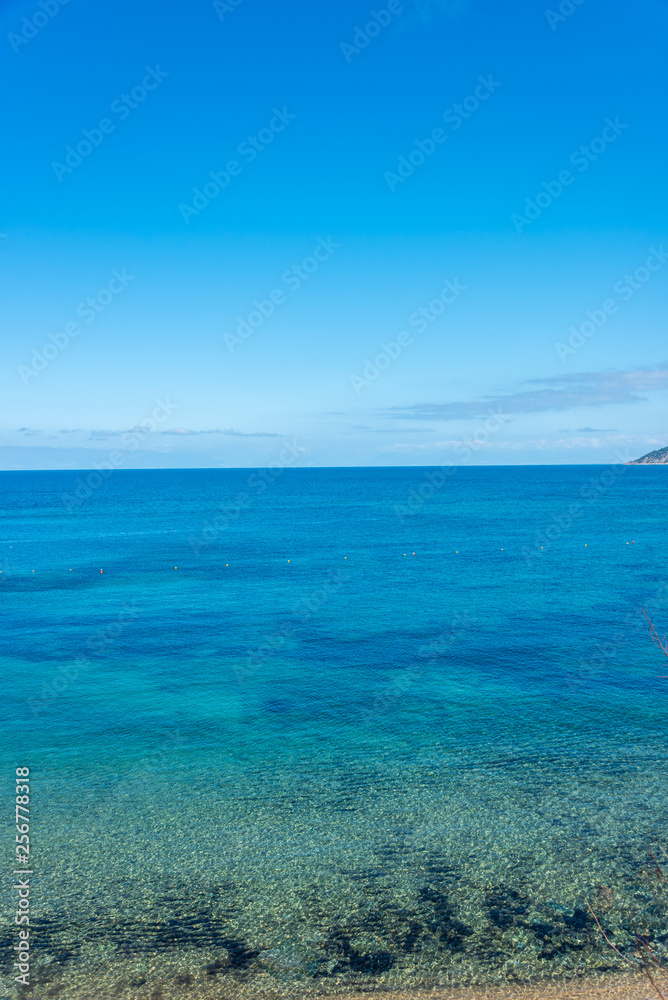 Clouds Over the Turquoise Waters of the Southern Mediterranean Sea on the Italian Coast