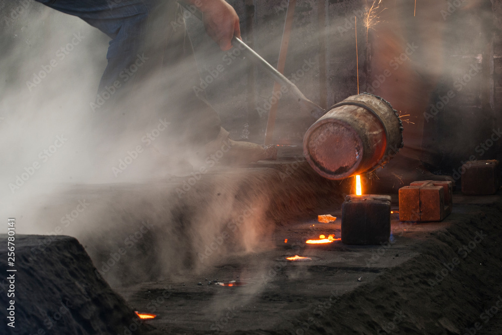 Obraz premium red high temperature fire metal casting method