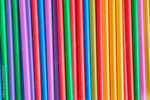 Abstract colorful background. Background from cocktail tubes close up. Soft focus.