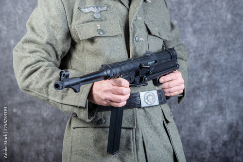 belt and machine gun of the German soldier in jacket the second world war