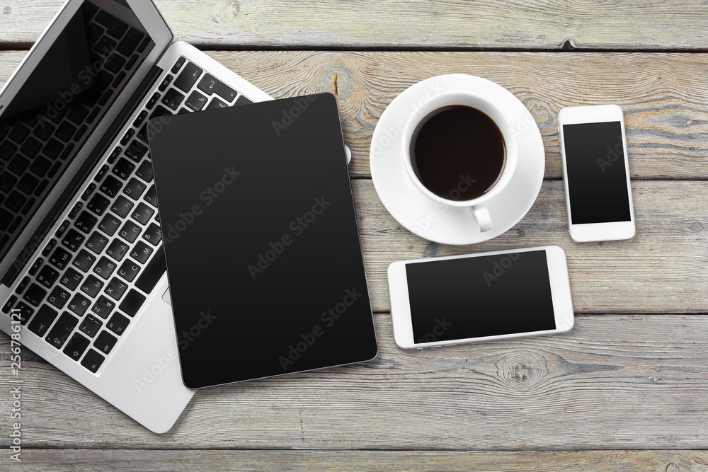 Open laptop with digital tablet and smartphone close up Open laptop with digital tablet and smartphone close up