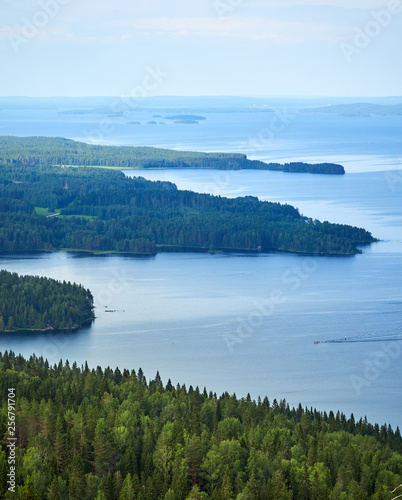 Fototapeta Naklejka Na Ścianę i Meble -  Scenic summer landscape view over the lake Pielinen from the top of the UkkoKoli, a fell at the Koli national park in Joensuu, Finland, the land of a thousand lakes.