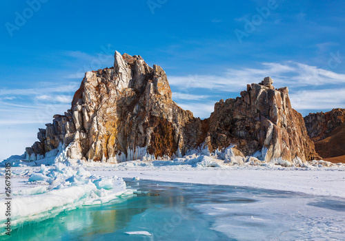 View of Shamanka rock on a sunny winter day. Lake Baikal, Olkhon island. Eastern Siberia, Russia