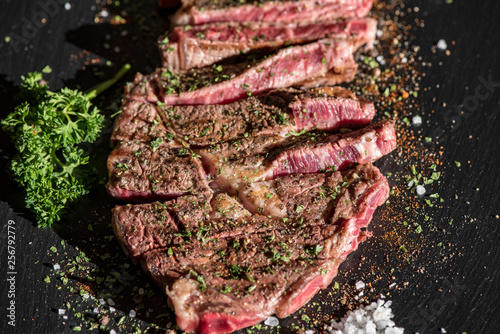 Grilled flat iron steak shot in flat lay style