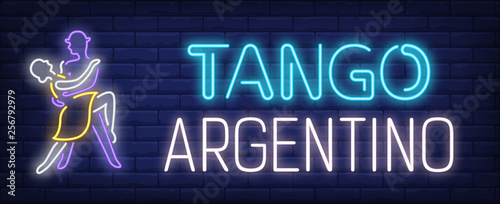Tango Argentino neon text with elegant couple dancing