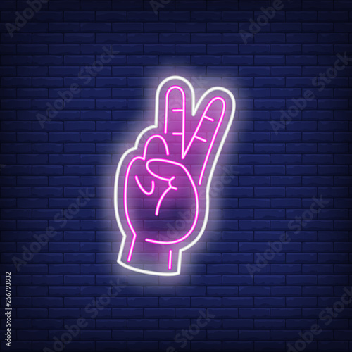 Pink peace gesture neon sign