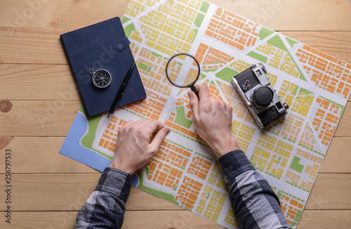 Male hands with city map, m...