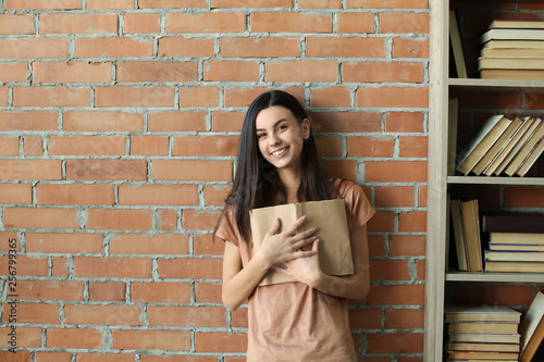 Beautiful young woman with ...