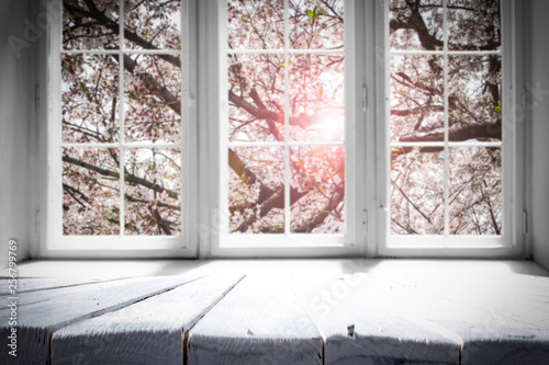 Desk of free space and spring window background 