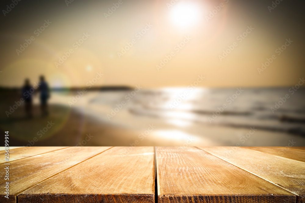 Desk of free space and summer sunset time 
