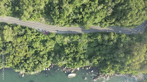 Drone aerial view showing the jungle mountain from Interpraias road at Balneario Camboriu, Santa Catarina, Brazil photo