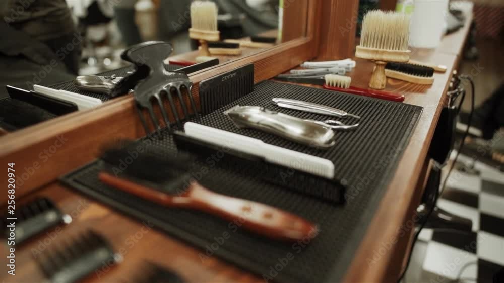 the Barber trims the beard of a bearded man the Barber trims the beard of a bearded man
