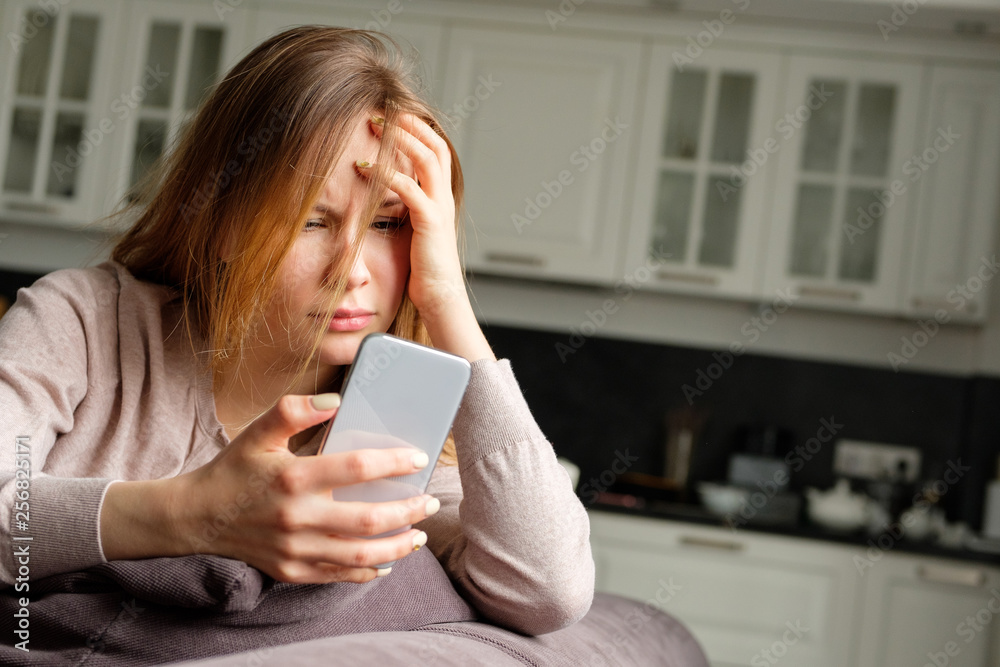 Upset girl with a phone Upset girl with a phone