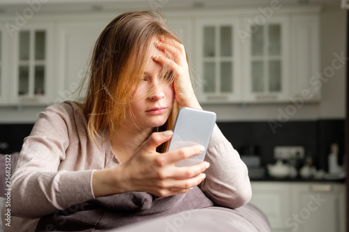 Upset girl with a phone