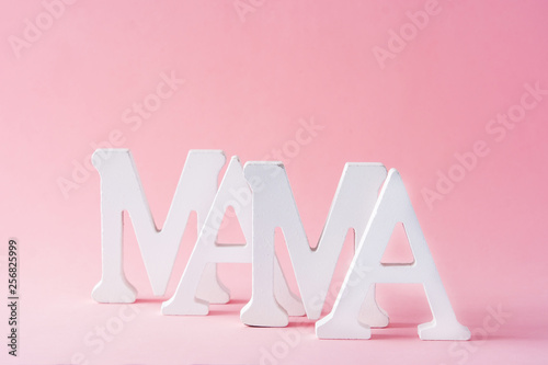 Mama word on pink background. Mother's Day concept
