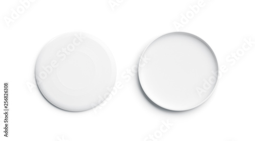 Blank white plastic frisbee mockup, isolated, front and back, 3d rendering. Empty frisbie for throwing mock up, top view. Clear round toy for playing with dog tempalate. photo