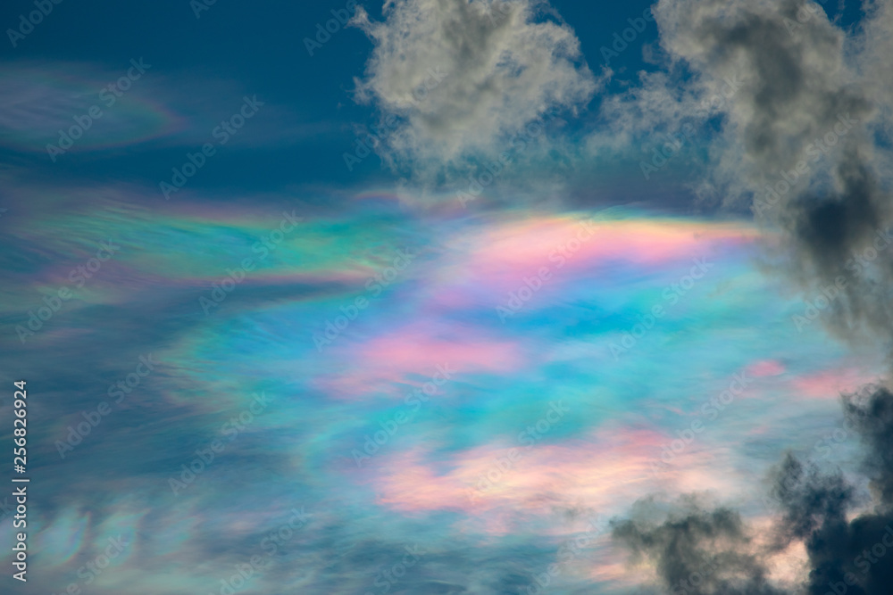 Iridescent clouds in the evening time. 