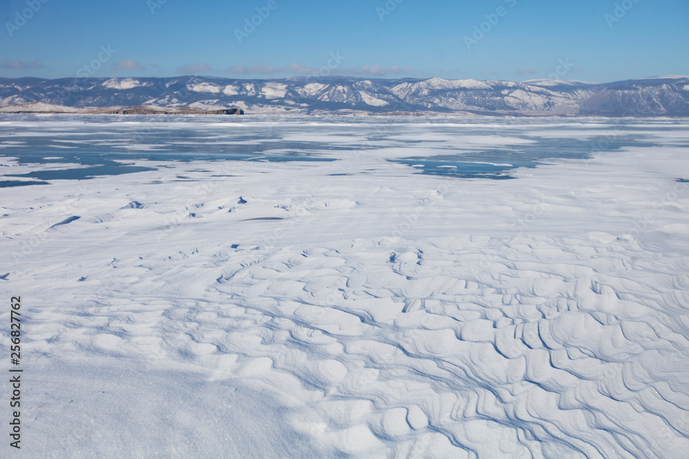 Lake Baikal, winter. Wavy snow