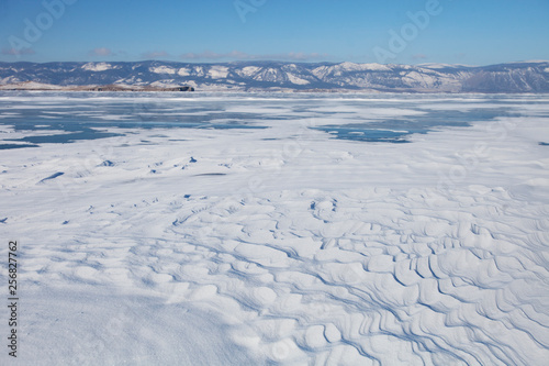 Lake Baikal  winter. Wavy snow