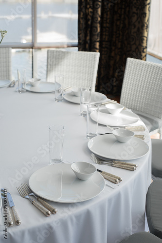 Event white restaurant table served and wait for guests © Kate