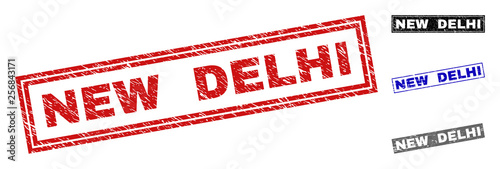 Grunge NEW DELHI rectangle stamp seals isolated on a white background. Rectangular seals with grunge texture in red, blue, black and grey colors.