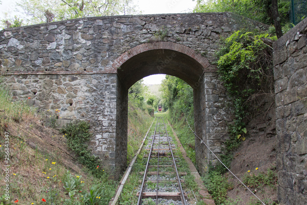 Red funicular and railroad, Montecatini, Tuscany, Italy.