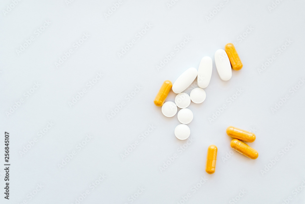 The photo of several tablets on a white background The photo of several tablets on a white background