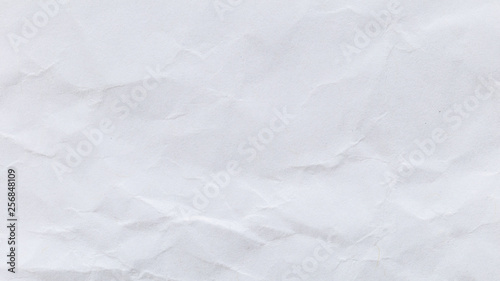 Crumpled white recycled paper background for business communication and education concept design.