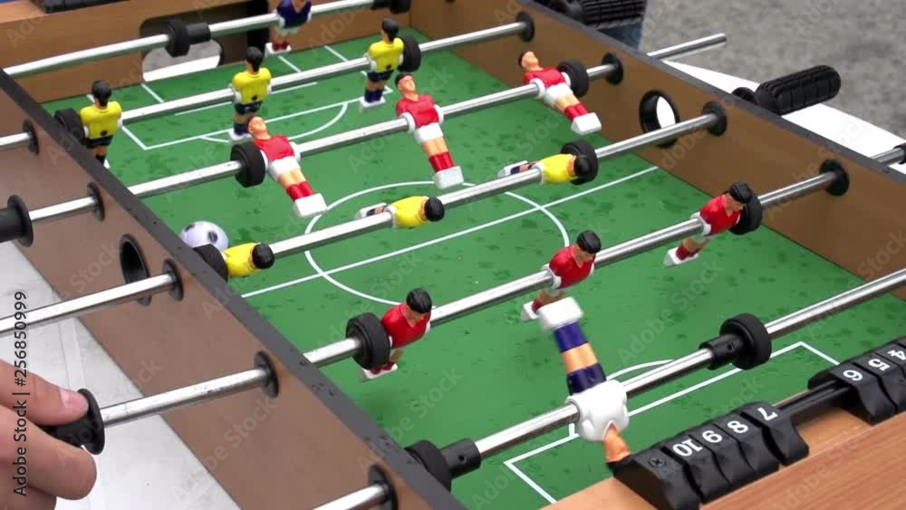 Foosball. Board game outdoors closeup. Slow Motion at a rate of 240 fps Foosball. Board game outdoors closeup. Slow Motion at a rate of 240 fps