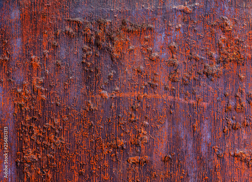 Red metallic surface.