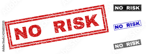 Grunge NO RISK rectangle stamp seals isolated on a white background. Rectangular seals with grunge texture in red, blue, black and gray colors.