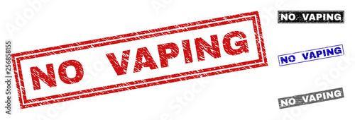 Grunge NO VAPING rectangle stamp seals isolated on a white background. Rectangular seals with distress texture in red, blue, black and grey colors.