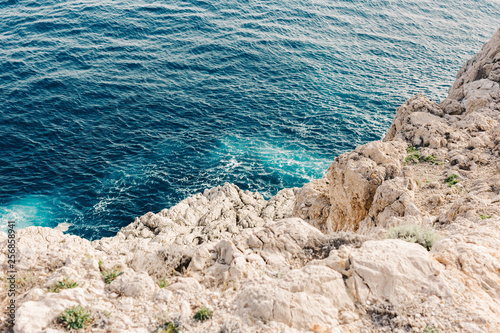 Fototapeta Naklejka Na Ścianę i Meble -  Capri coast view. Beautiful island beach with rocks
