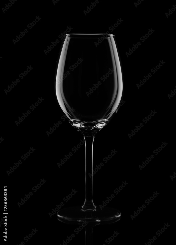 empty wine glass on a black background. silhouette of a glass. cogncept empty wine glass on a black background. silhouette of a glass. cogncept