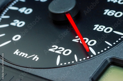 Close up shot of a speedometer in a car, 200 km/h