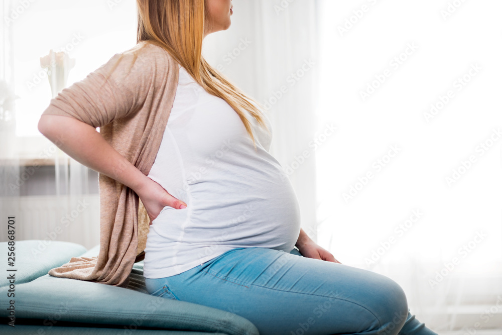 Lower back pain, discomfort during pregnancy