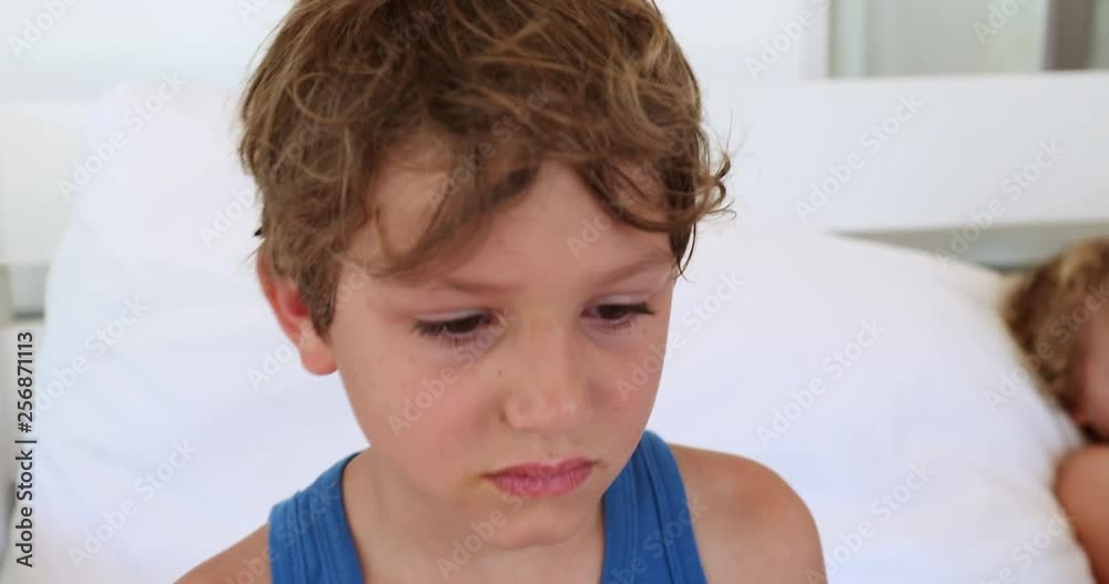 Child boy saying no, bashful candid