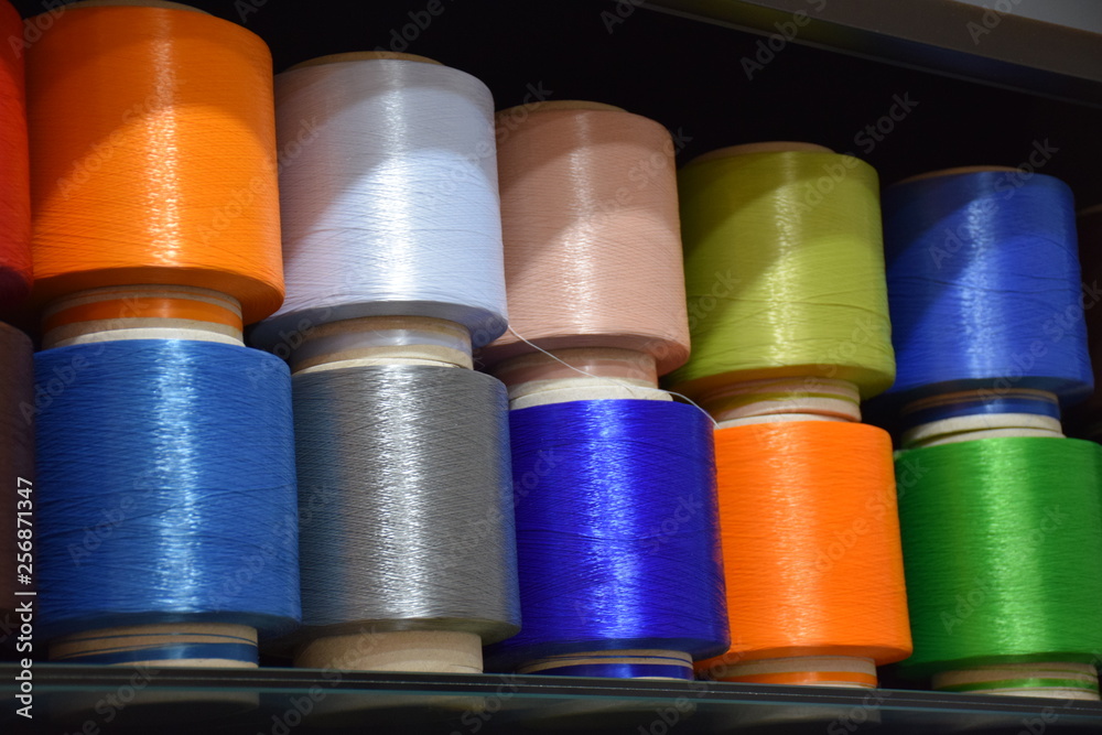 Large colorful polypropylene thread set in rainbow mood. Multicolor bobbin thread. Polypropylene multifilament yarns. Set of sewing thread coils, miscellaneous colours. Large colorful polypropylene thread set in rainbow mood. Multicolor bobbin thread. Polypropylene multifilament yarns. Set of sewing thread coils, miscellaneous colours.