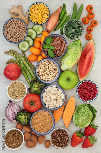 Alkaline super food concept for ph balance with fresh fruit,vegetables, legumes, medicinal herbs, spice, whole wheat pasta, seeds & nuts. High in omega 3, antioxidants, anthocyanins, fibre & vitamins.
