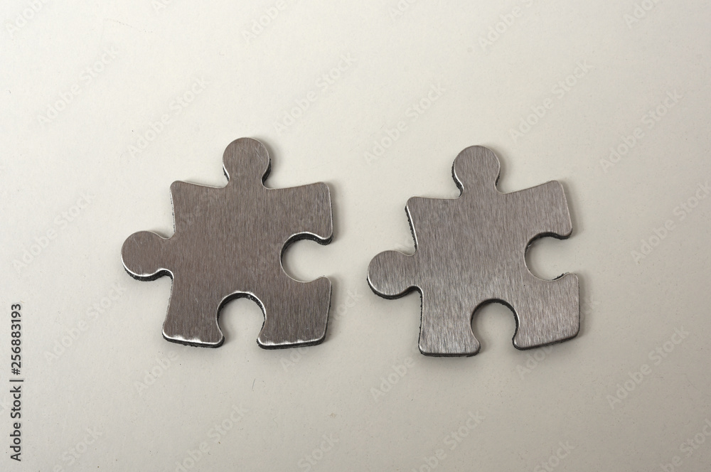 metal puzzle on a white background metal puzzle on a white background