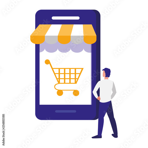 young man using smartphone with shopping cart