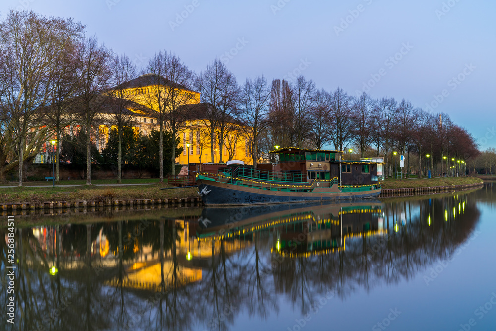 Fototapeta premium Germany, Ship anchoring on saar river in saarbruecken city