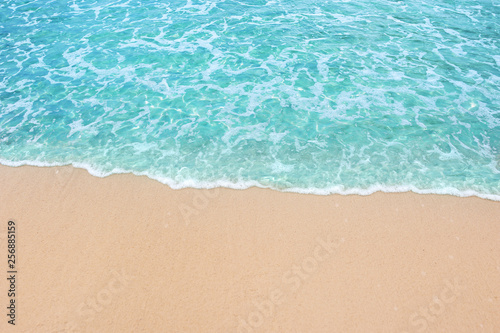 Soft blue ocean wave and water sea clear on clean sandy beach