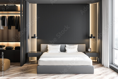 Gray master bedroom interior with wardrobe photo