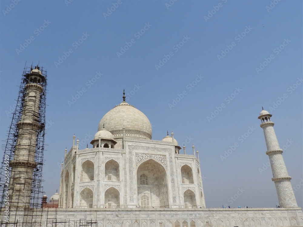 Taj Mahal mausoleum and symbol of love, white ivory marble on the South Bank of the Yamuna river in the Indian city of Agra, Uttar Pradesh.