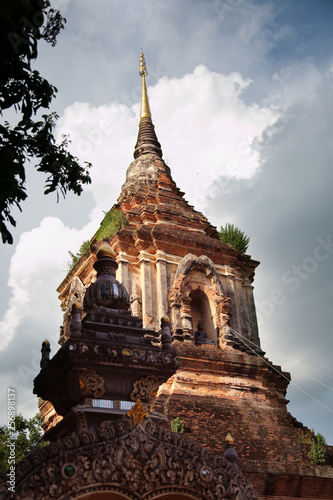 Wood entrance and pagoda in Chiang Mai Thailand © Leo_Ley